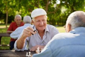 active-retired-seniors-two-old-men-playing-chess